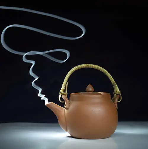 smoking tea pot