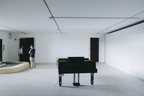 Piano in White Room