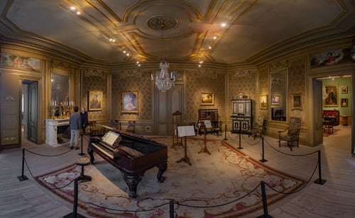 Piano under Chandelier